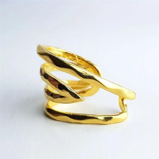 PIERCING 2 AROS TRABALHADOS DETALHE EM V NO MEIO|BANHADO EM OURO