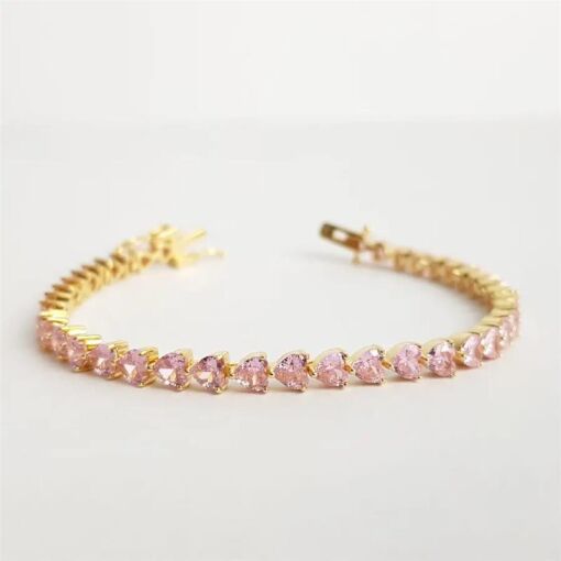 PULSEIRA RIVIERA EM CORACOES ROSA|17CM|BANHADO EM OURO 18K