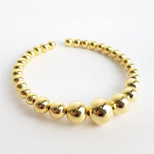 BRACELETE ARO ABERTO EM ESFERAS LISAS|BANHADO EM OURO 18K