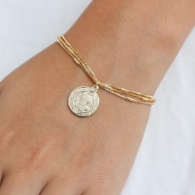 Pulseira folheada 03 fios com medalha de São Bento e 01 zircônia