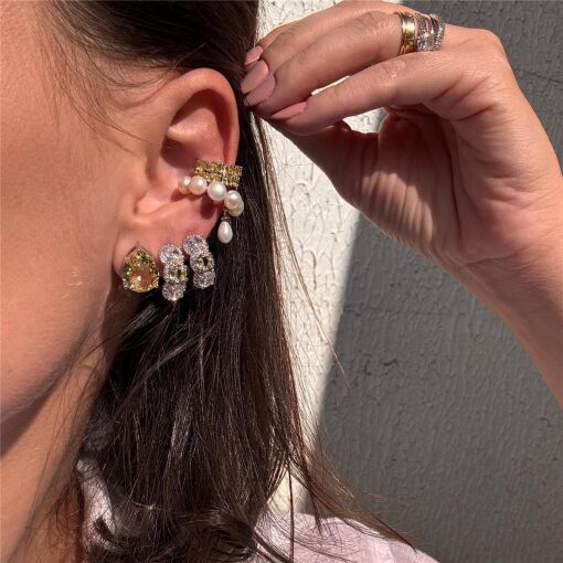 PIERCING PONTO DE LUZ FLUIR