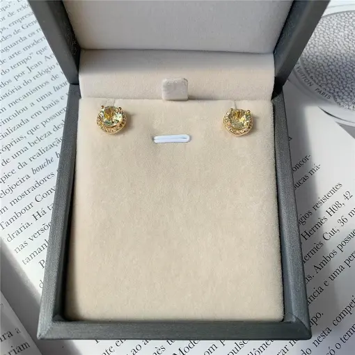 BRINCO PONTO DE LUZ 7MM CRAVEJADO ONDULADO TRIP