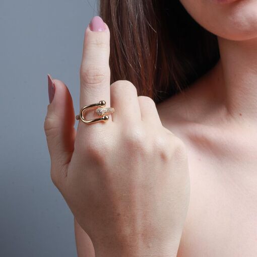 ANEL COM CRAVAÇÃO ABERTO DOURADO TAM. 20