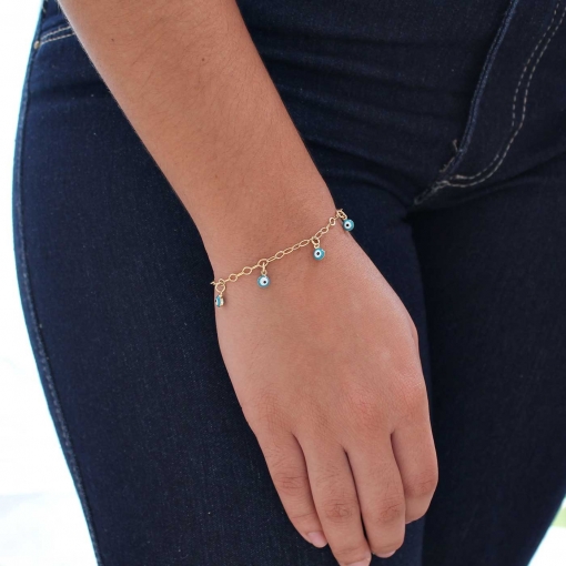 Pulseira com sete pingentes olho grego