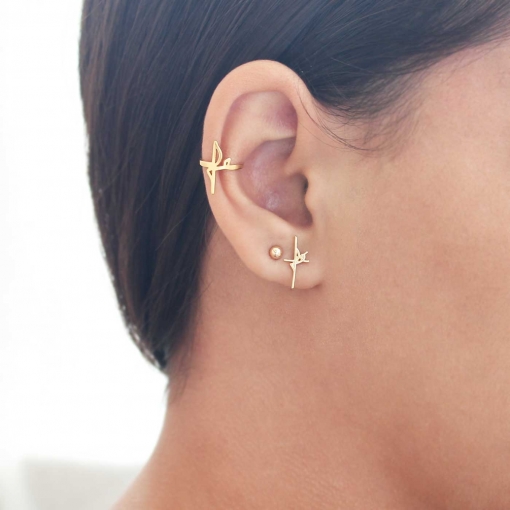 Brinco escrito "fé"