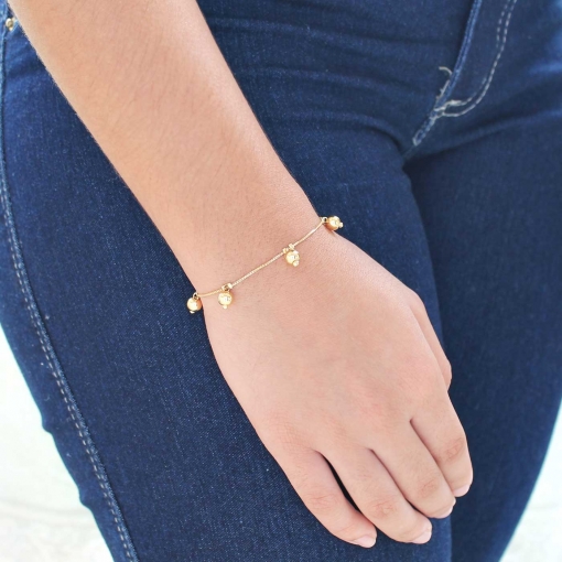 Pulseira com bolas lisas e corrente veneziana