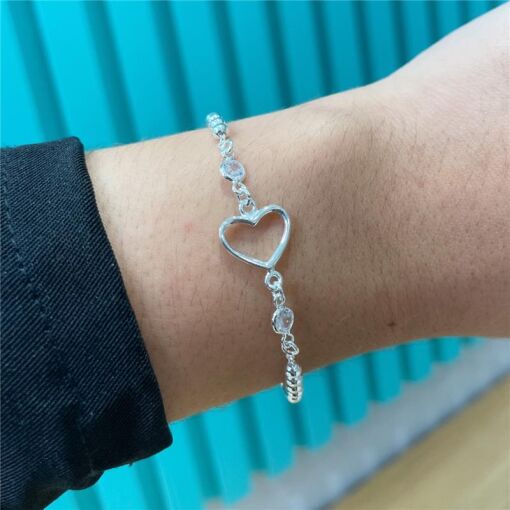 PULSEIRA CORAÇÃO VAZADO - BOLINHAS - ZIRCÔNIA