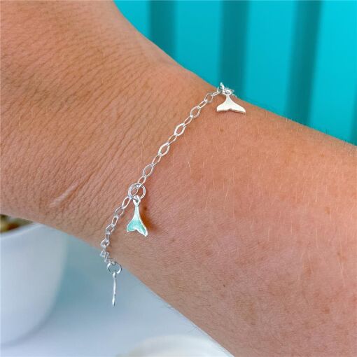 PULSEIRA CAUDA BALEIA
