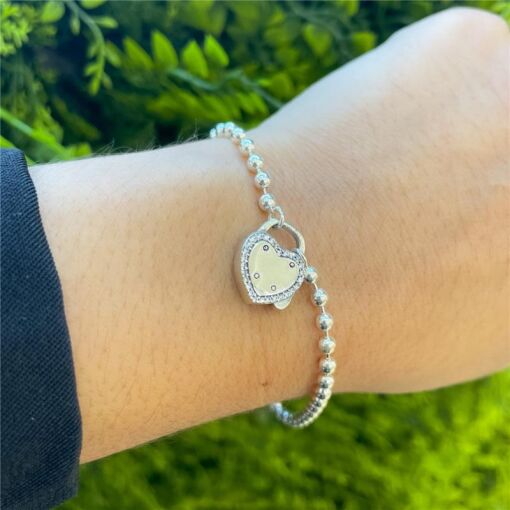 PULSEIRA BOLINHAS CORAÇÃO CADEADO BORDA ZIRCÔNIA