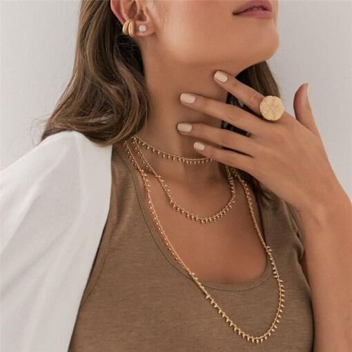 PIERCING DE ORELHA UNITÁRIO TRABALHADO E LISO BANHADO A OURO