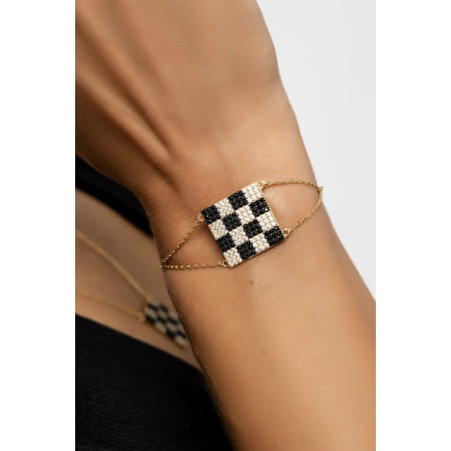 PULSEIRA COM PINGENTE QUADRADO XADREZ BANHADA A RÓDIO