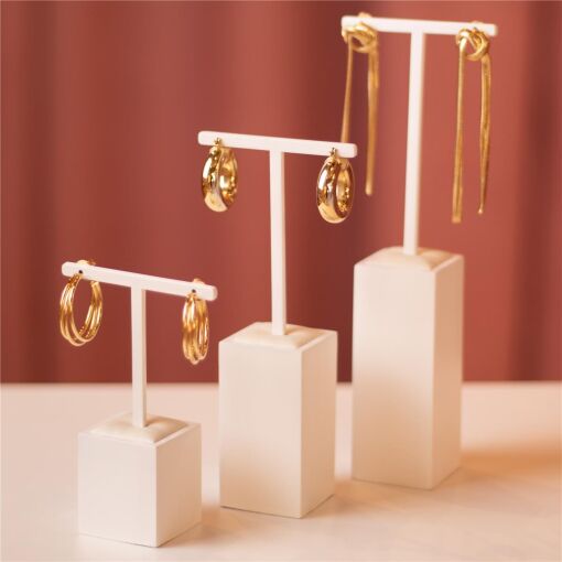 EXPOSITOR BRINCO T PÉROLA LAQUEADO + FACTO OFF WHITE