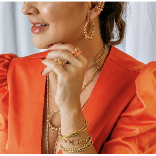 ANEL EM OURO 18K E PEDRA CORAL