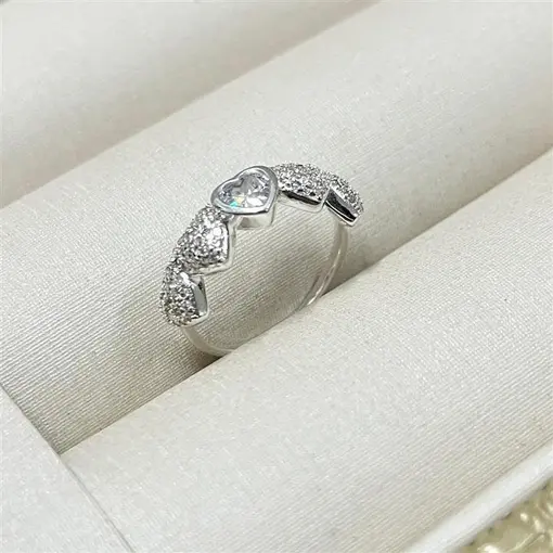 ANEL CORAÇÕES 4CRAV/1 PEDRA  FOLHEADO A PRATA