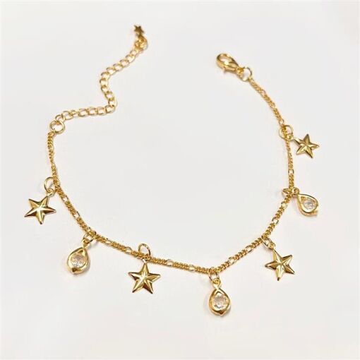 PUL ESTRELA E GOTA CRISTAL FOLHEADO A OURO 18K