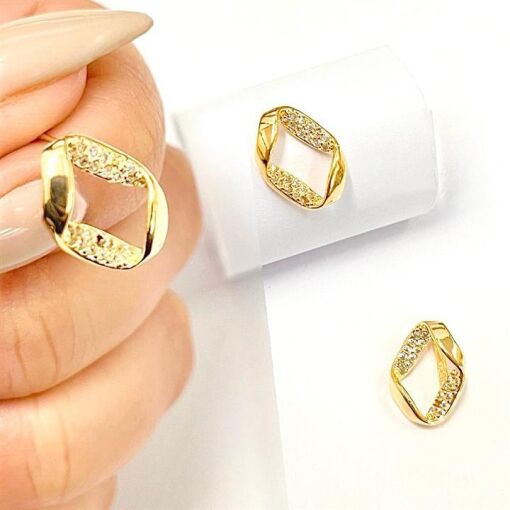 CONJ OVAL TORCIDO CRAVEJADO  FOLHEADO A OURO 18K