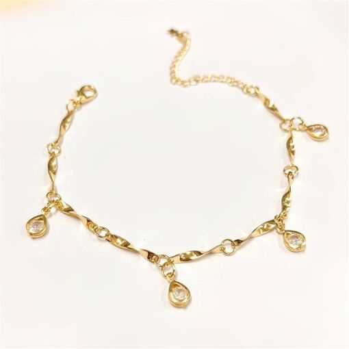 PUL GOTAS ZIRC  FOLHEADO A OURO 18K
