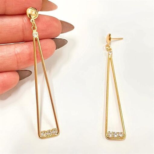 BR TRIANGULO LONGO  FOLHEADO A OURO 18K