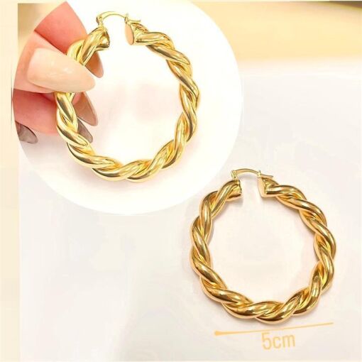 BR TRANQ 5CM TORCIDA 8MM FOLHEADO A OURO 18K