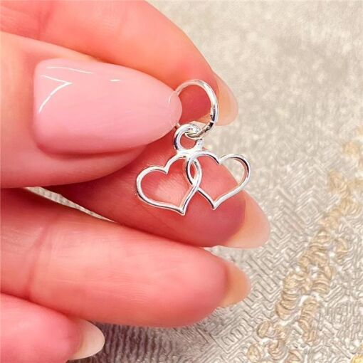 PINGENTE 2 CORAÇÕES LISOS VAZADOS PRATA 925