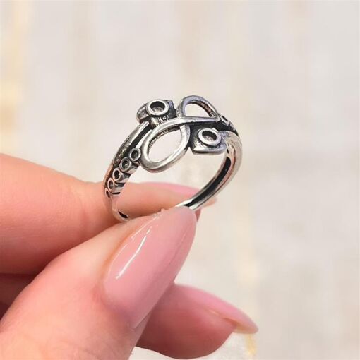 ANEL C/ SIMBOLO DO INFINITO E CORAÇÃO C/ ZIRCONIA PRATA 925
