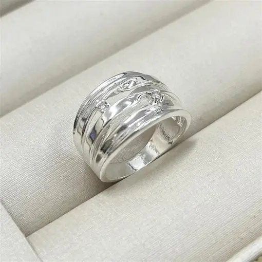 ANEL LARGO VAZADO C/ 2 ZIRC FOLHEADO A PRATA