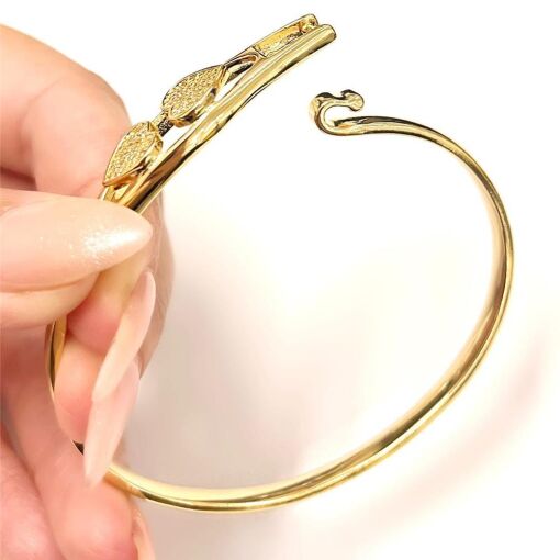 BRACELETE 2 CORAÇÕES CRAV. FOLHEADO A OURO 18K