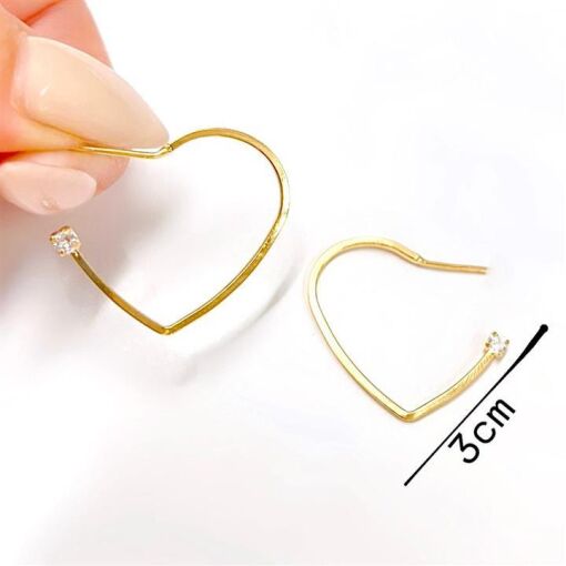 BR CORAÇÃO C/ PONTO DE LUZ 3CM FOLHEADO A OURO 18K