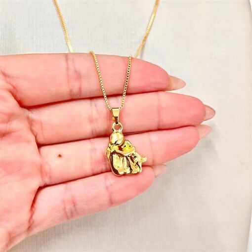 GARG C/MULHER SENTADA C/ CAHCORRO FOLHEADO A OURO 18K