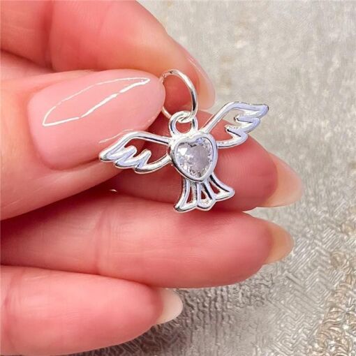 PINGENTE ANJINHO C/ CORAÇÃO EM ZIRCONIA PRATA 925