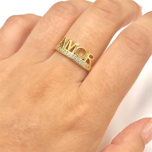 ANEL AMOR C/ FILEIRA ZIRC FOLHEADO A OURO 18K