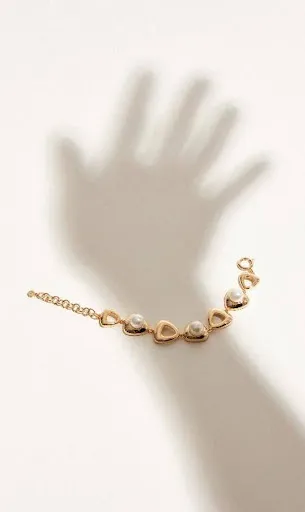 Coleção Aurora: joias com pérolas e formas geométricas