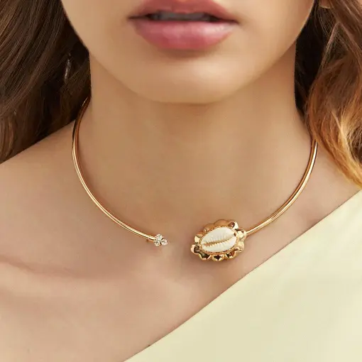 ARO DE BÚZIOS COM CRISTAIS REDONDOS E ABERTURA