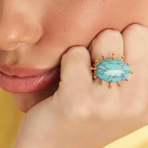 ANEL COM PEDRA RECONSTITUÍDA OVAL E ESFERAS LISAS