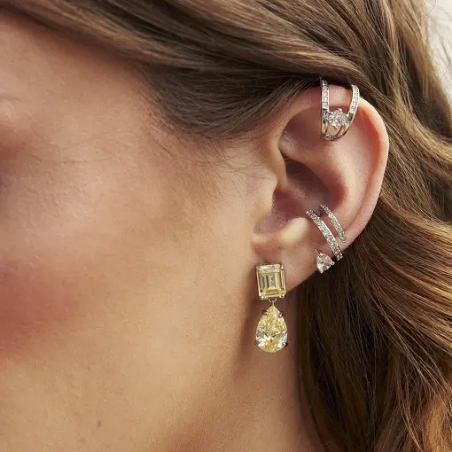 PIERCING DE ORELHA UNITÁRIO COM DUAS VOLTAS CRISTAL E ZIRCÔNIAS