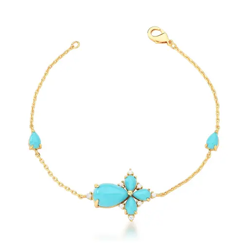PULSEIRA COM PINGENTE DE FLOR E CRISTAIS CABOCHÃO BANHADO A OURO
