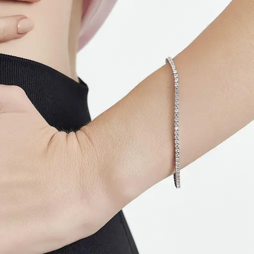 PULSEIRA RIVIERA COM ZIRCÔNIAS REDONDAS BRANCAS PRATA RODINADA