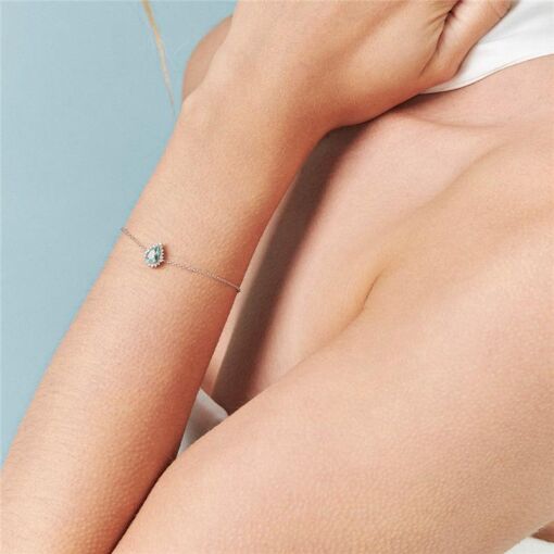 PULSEIRA COM CRISTAL DE GOTA E ZIRCÔNIAS PRATA RODINADA