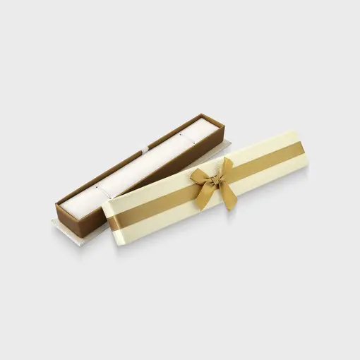 CAIXA CARTONADA PARA PULSEIRA NA COR CHAMPAGNE COM LAÇO DOURADO