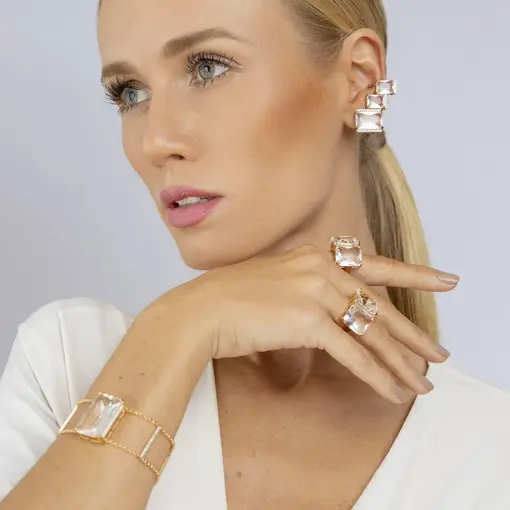 PULSEIRA COM CRISTAL RETANGULAR TRANSPARENTE BANHADO A OURO