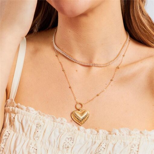 CHOKER COM ZIRCÔNIAS EM BAGUETE BRANCAS BANHADA A OURO