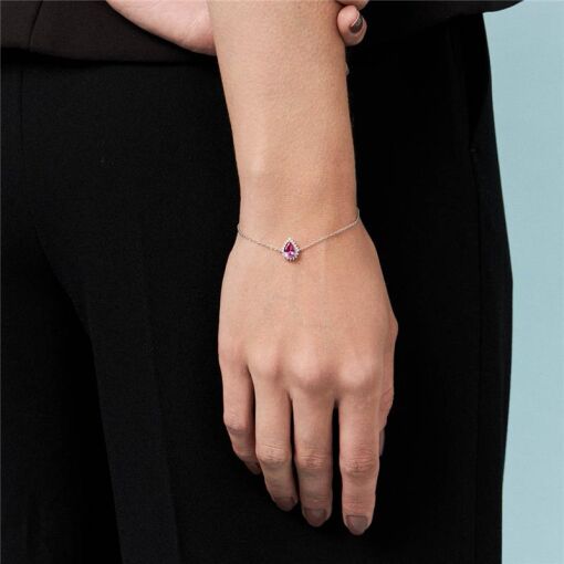 PULSEIRA COM CRISTAL DE GOTA E ZIRCÔNIAS PRATA RODINADA