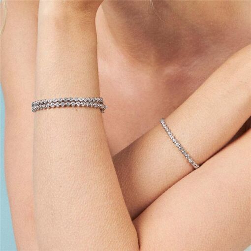 PULSEIRA COM CRISTAIS REDONDOS PRATA RODINADA